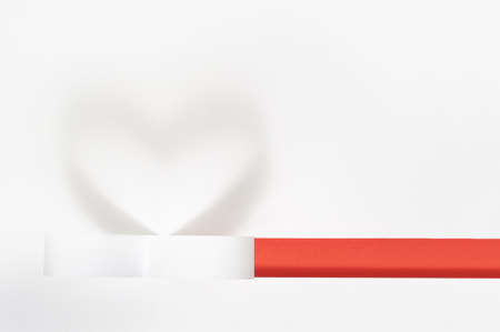 white beautiful paper heart with shadow, valentines day backgroundの写真素材