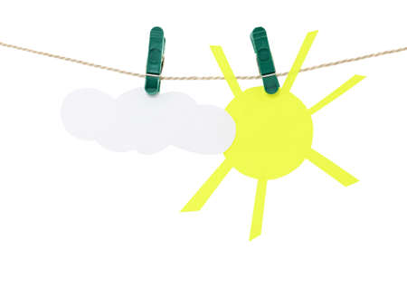 Sun and cloud hanging on a rope.の写真素材