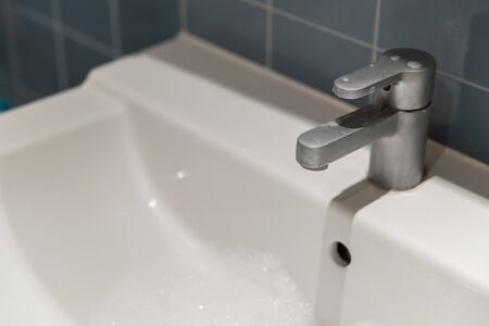 close-up tap or faucet in bathroom, no waterの写真素材