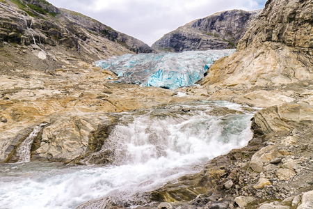 Glacier becoming a river due to global warming, Norwayの写真素材