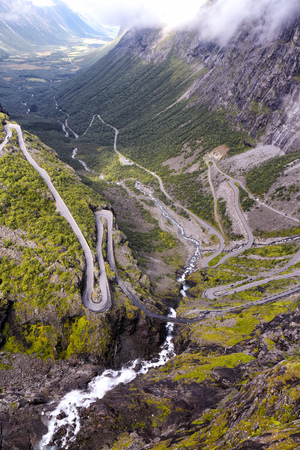 Mountain road in the valley in Norwayの写真素材