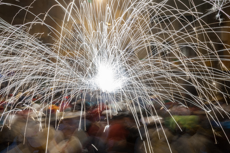 Sparks at a festival at dusk in castellon, spainの写真素材