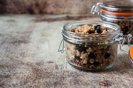 Vegetarian dish: granola with nuts, raisins and sesame seedsの写真素材