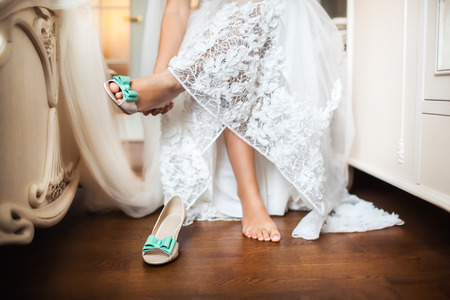 Bride's shoes on wedding day. Morning bride. Getting readyの写真素材