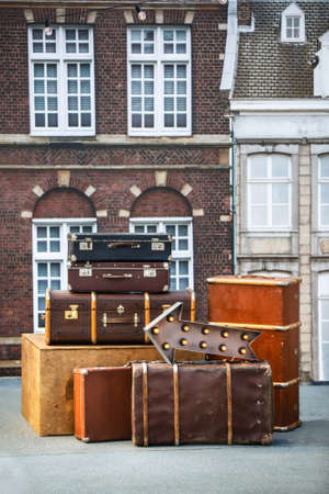 Pile of vintage suitcases. Vintage travel luggage.の写真素材