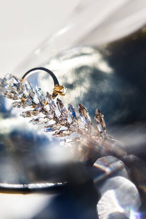 Wedding ring on the wedding shoes and highlights.の写真素材