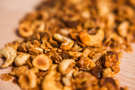 Tasty homemade granola on wooden tableの写真素材