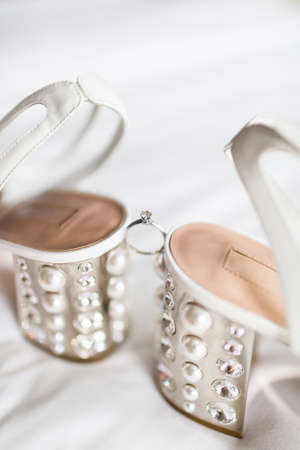 Three wedding ring on a black background.の写真素材