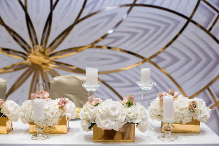 Table number on stand at wedding party.