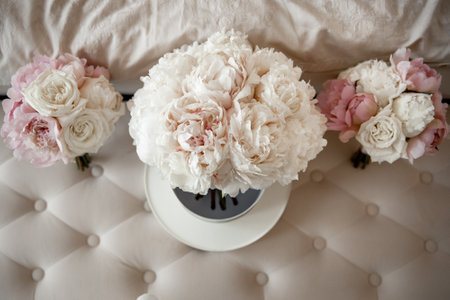 Wedding set of four bouquets for bridesmaids on the sofa.の写真素材