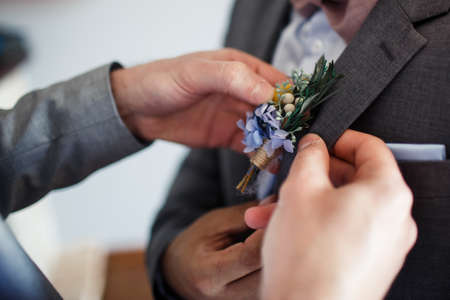 Bride's back in the wedding dress. Wedding day.の写真素材