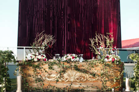 Bouquet of flowers in vase on the wedding table.の写真素材