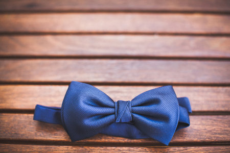 Blue wedding butterfly on a wooden background.の写真素材