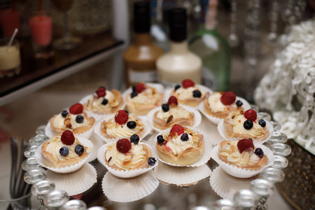 Rows of desserts on the wedding table.の写真素材
