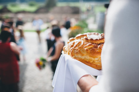 Wedding bread from wheat flour dough on the plate.の写真素材