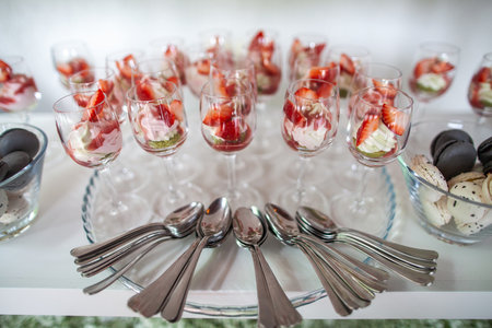 Rows of desserts on the wedding table.