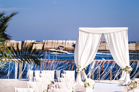 Outdoor wedding ceremony in the olive garden.の写真素材