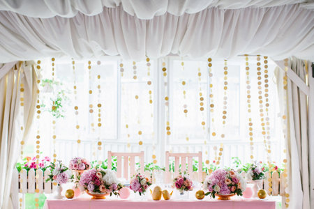 Bouquets of flowers in vase on the wedding table.の写真素材