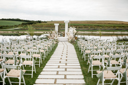 Outdoor wedding ceremony in the olive garden.の写真素材
