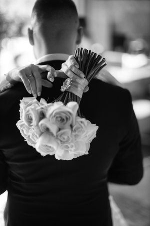 Wedding bouquet of roses wedding in the hands of the bride.の写真素材