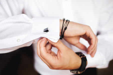 Groom in the morning during wedding preparations.の写真素材