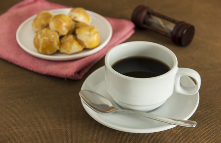 Coffee with bread or cookies for breakfast.の写真素材