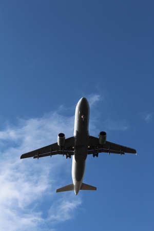 Berlin, Germany - February 07, 2019: airplane in the sky approaching Berlin-Tegel Airportのeditorial素材