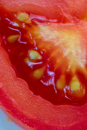 Close up of a ripe and beautiful red tomatoの写真素材