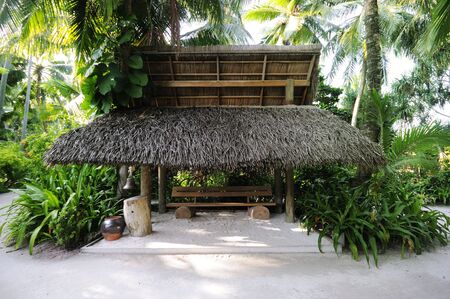 thatched house at maldivesの写真素材