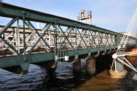 Photo of A railway bridge on the Thames River in London, England
