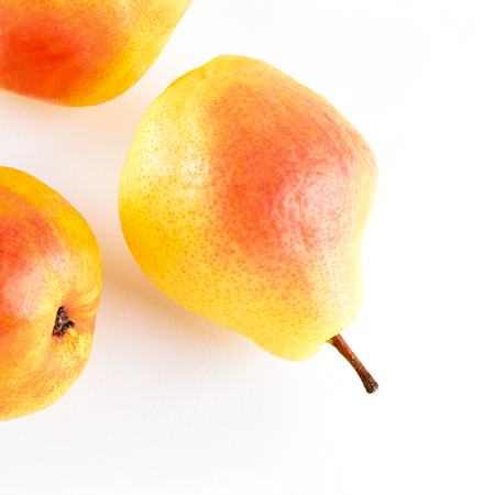 Fresh yellow pears isolated on white backgroundの写真素材