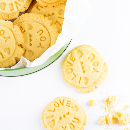 Homemade cookies with 'I love you' text in jar isolated on white backgroundの写真素材