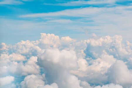 Beautiful natural cloudscape and sky. Aerial view from airplane window