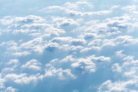 Sunrise above clouds from airplane window. Natural background.
