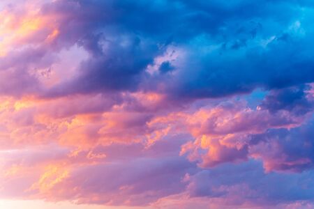 Dramatic sky with bright red and dark blue stormy clouds. Nature backgroundの写真素材