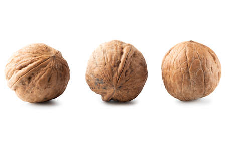 Three walnuts isolated on white background. Clipping Pathの写真素材