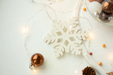 Snowflake on white wooden table. Christmas decoration. Soft focusの写真素材