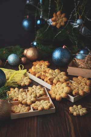 Christmas snowflakes gingerbread cookies with Christmas decorations. New Year and Christmas celebration concept. Soft focus.の写真素材