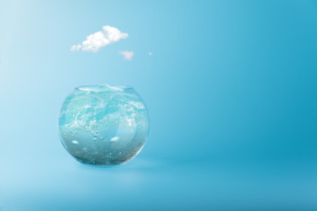 Aquarium with sea water waves on blue background. World environment day or water conservation conceptの写真素材