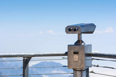 Binoculars vending machine on top of mountain
