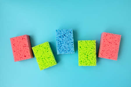 Kitchen cleaning set of sponges on blue background. Top viewの写真素材