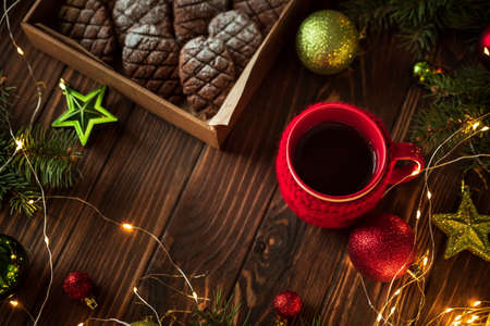 Christmas gingerbread cone cookies with Christmas decorations. New Year and Christmas celebration concept. Soft focus. Top viewの写真素材