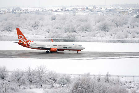 SkyUp airlines plane is getting ready for flight. Lviv, Ukraine - December 03, 2021