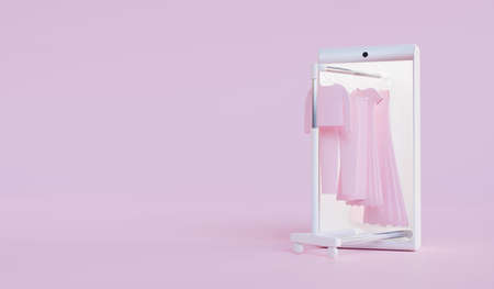 Online store. Rolling hanger rack with clothes from smartphone on pink background. E-commerce or online shopping concept. 3d renderの写真素材