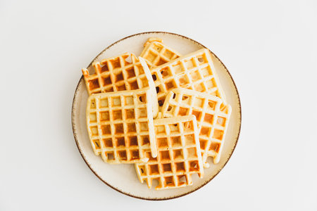 Belgian waffles on white table. top viewの写真素材