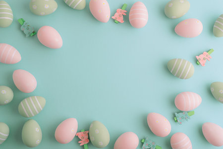 Easter eggs on pastel background. Top viewの写真素材