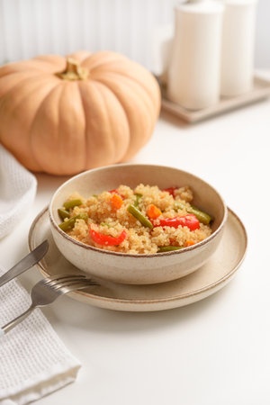 Healthy quinoa bowl with vegetables and pumpkin.の写真素材