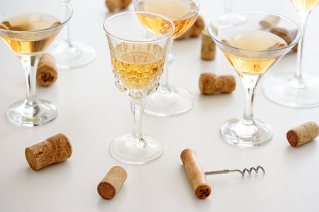 Set of glasses of yellow wine at wine tastingの写真素材