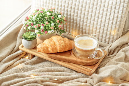 Cozy Morning: coffee with croissantの写真素材