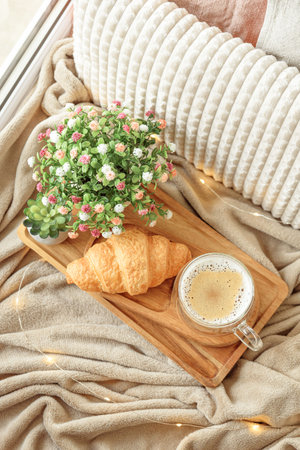 Cozy Morning: coffee with croissantの写真素材